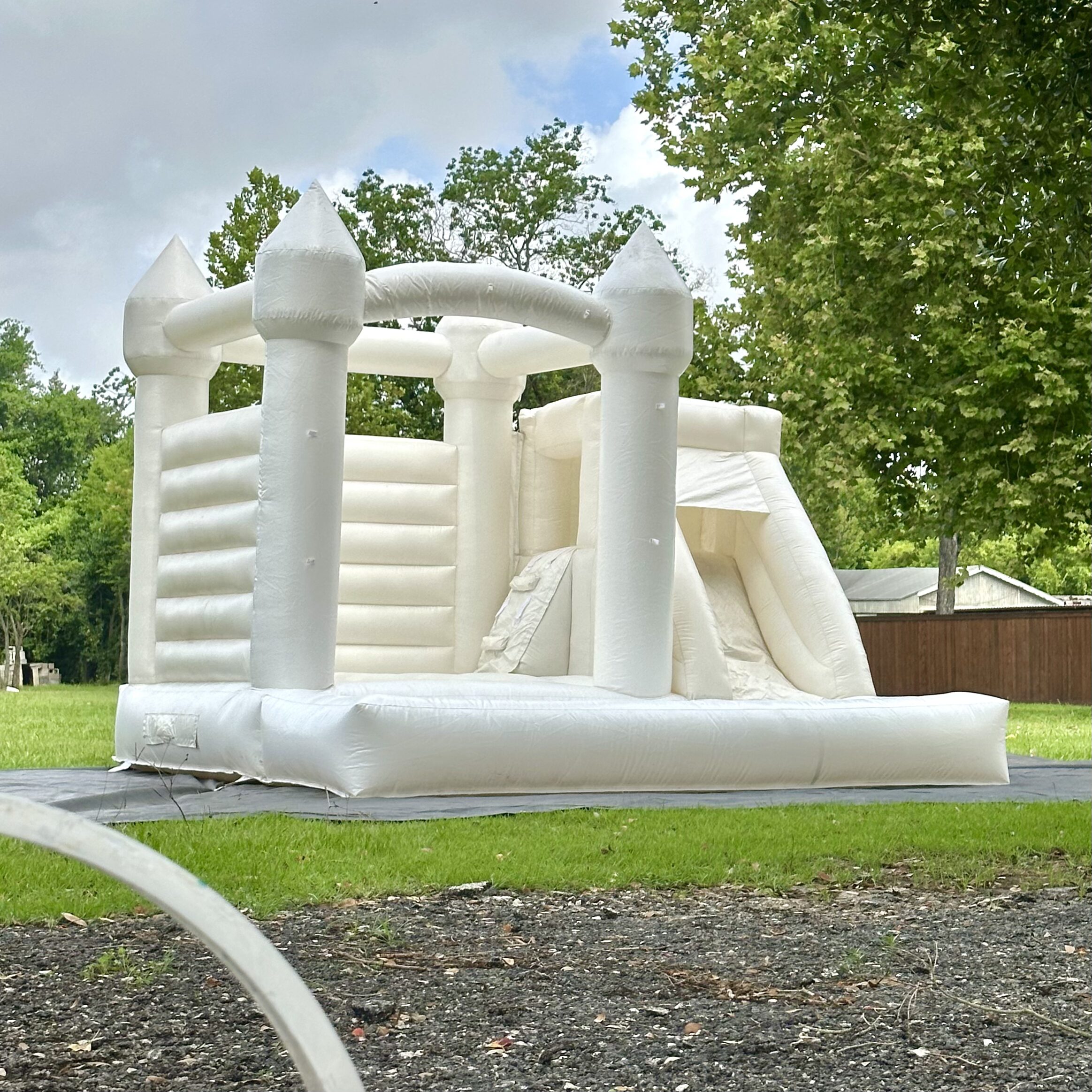 white bounce house rental set up in Porter, Texas